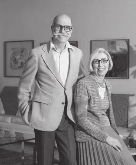 Ray, standing, and Billie Gough pose for a photo. 