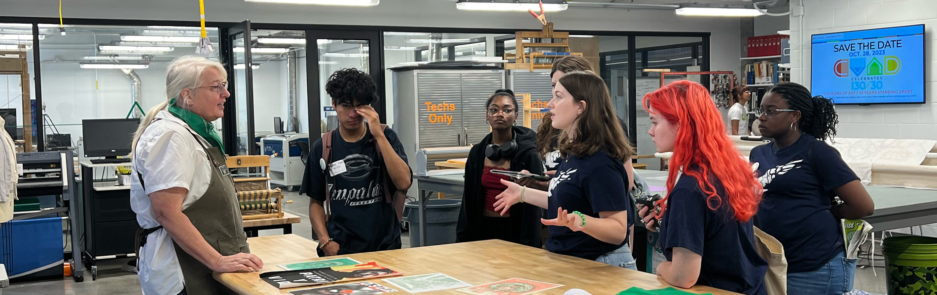 Fab Lab manager speaking to students.