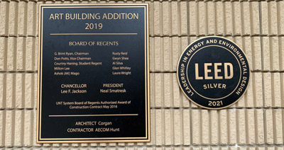 Plaques denoting the 2019 completion of the Art Building addition.