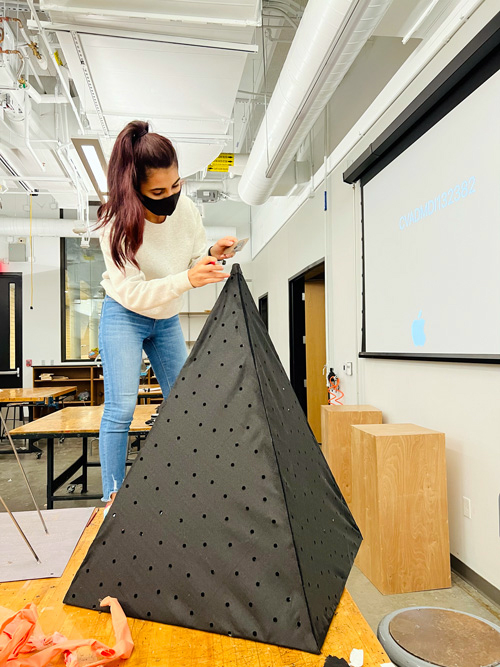 Student creating a sculpture.