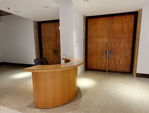 Interior doors of the Cora Stafford Gallery, large wooden doors with brass fixtures