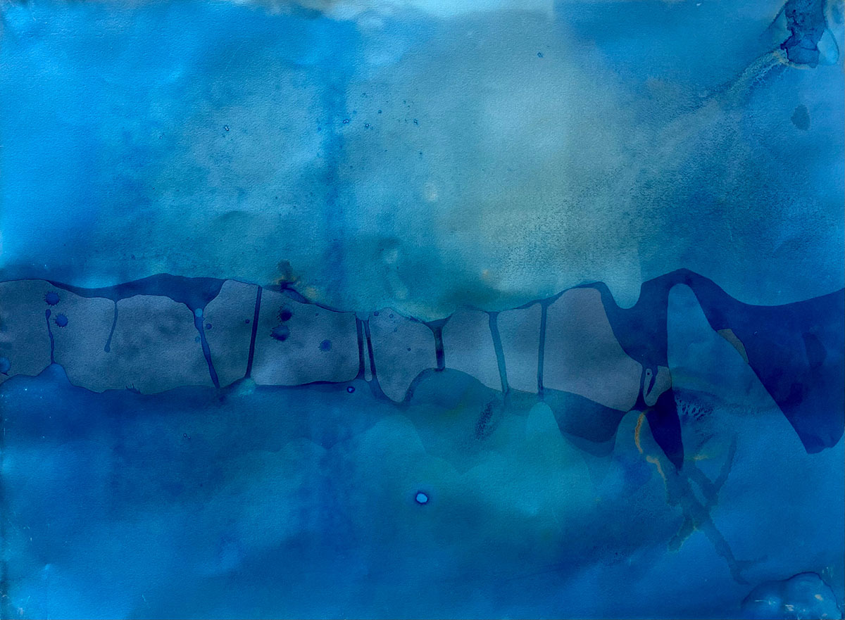 Abstract photograph with numerous blues. A horizontal darker area punctuates the composition. The transparency of the colors resembles a watercolor.
